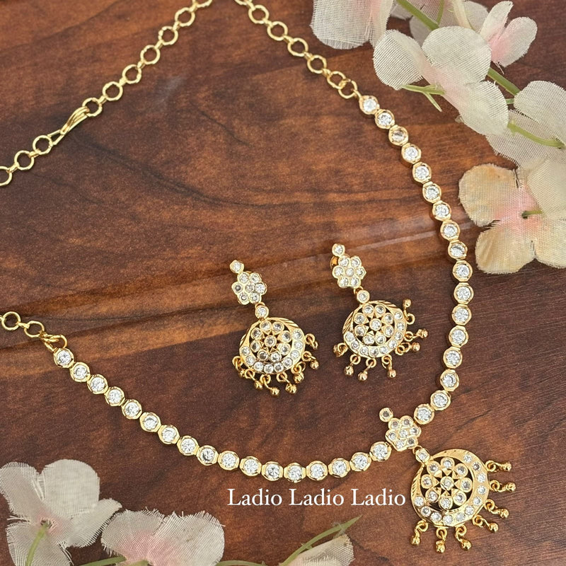 Impon Attigai with earrings